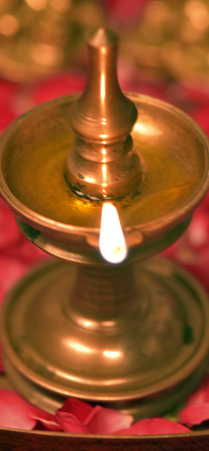 a lit nilavilakku, the traditional kerala oil lamp